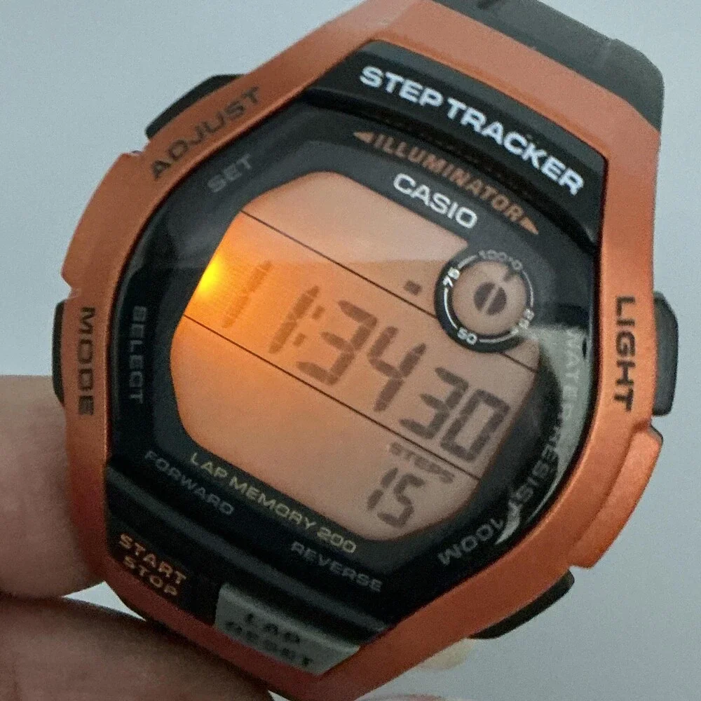 Casio WS-2000H Step Tracker Mens Watch 44mm Digital Orange Black 100M Sport